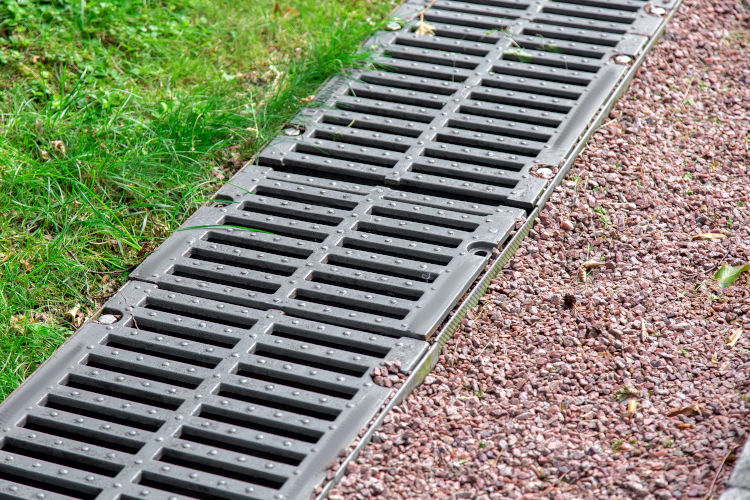 Steps To Solve Water Drainage Problems On Sloped Properties